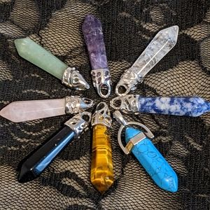 Natural stone Quartz pendants, an inch and half in length.